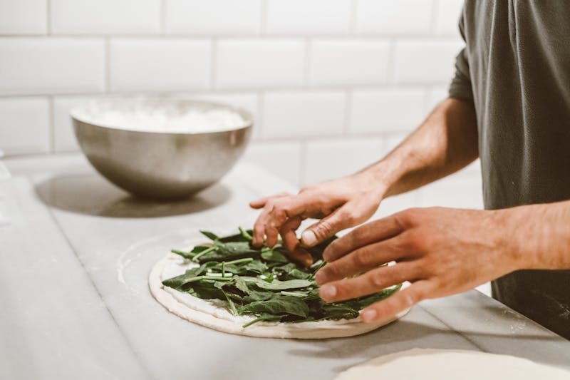 Chef Preparing Pizza